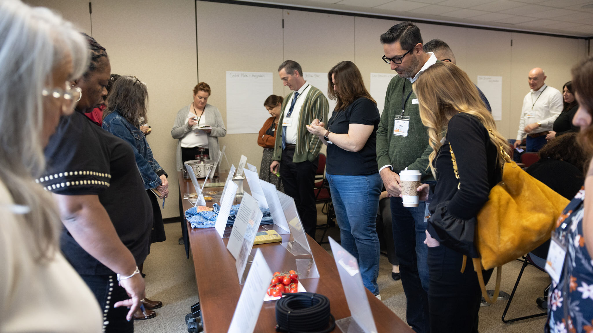 Attendees of the 2026 Winter Institute participate in a gallery walk during the Many Pieces, One People: Exploring Jewish Peoplehood and Identity workshop taught by the JFCS Holocaust Center
